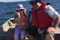 Man and Child fishing on Lake Simcoe