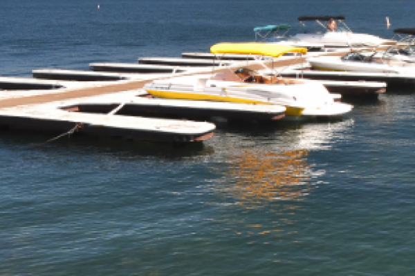 Boats tied up to a dock on Lake Simcoe